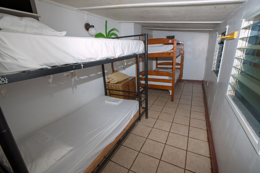 Bunk beds in a Plantation Village dorm cabin